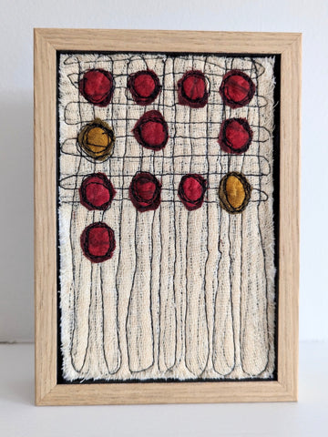 Patricia Kelly, Red and Amber Dots, textile art, 10.5 x 15.5 cm (12.5 x 17.5 x 3 cm framed)