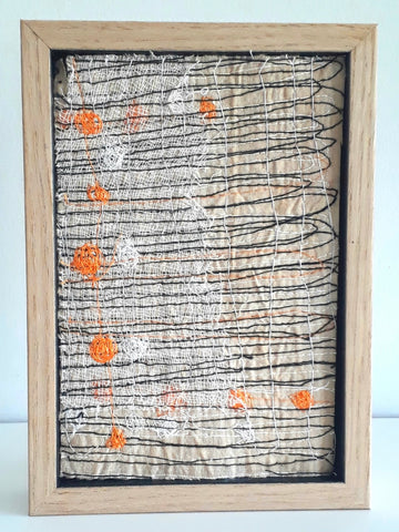 Patricia Kelly, White and Orange Dots with Black Horizontal Lines, textile art, 10.5 x 15.5 cm (12.5 x 17.5 x 3 cm framed)